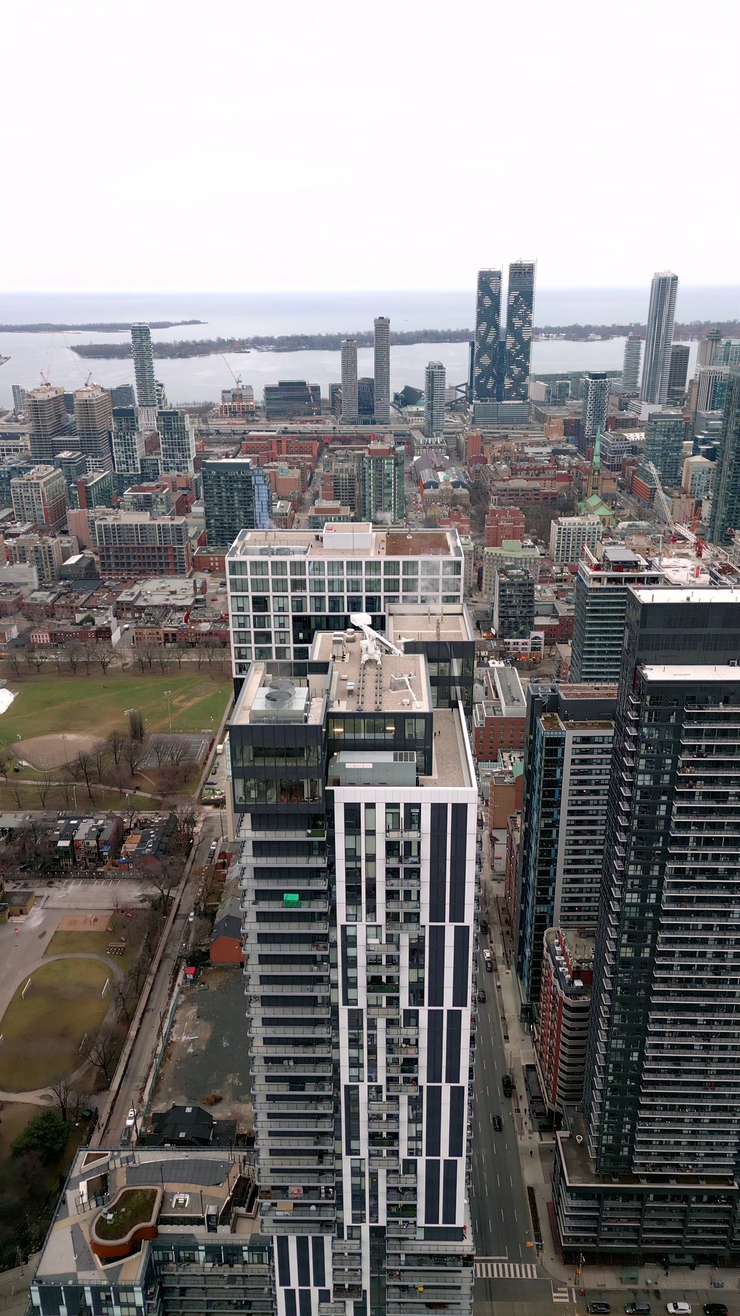 Toronto Skyline with Lake Ontario - Overcast Aerial — 4K stock footage