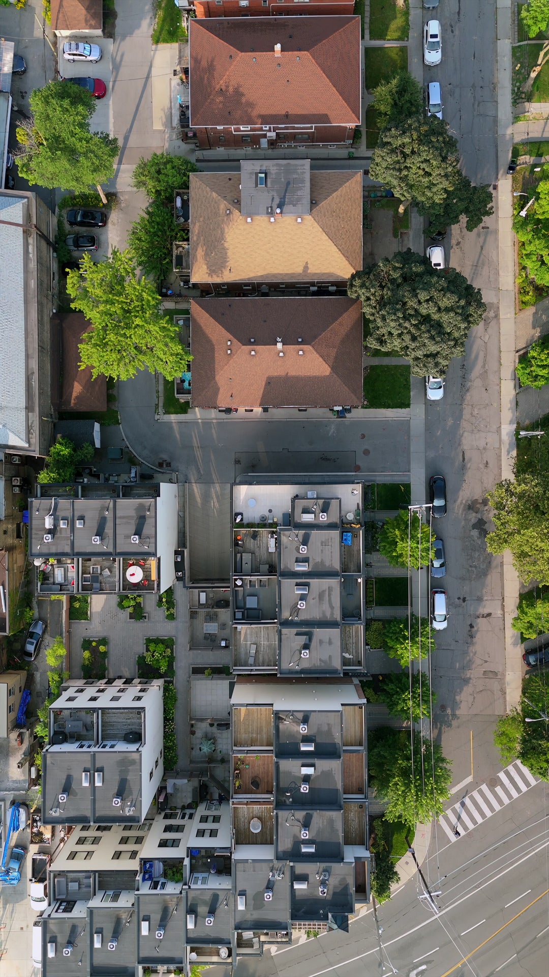 Aerial Top-Down View of Modern Urban Residential Neighborhood with Townhouses — Premium 4K stock footage