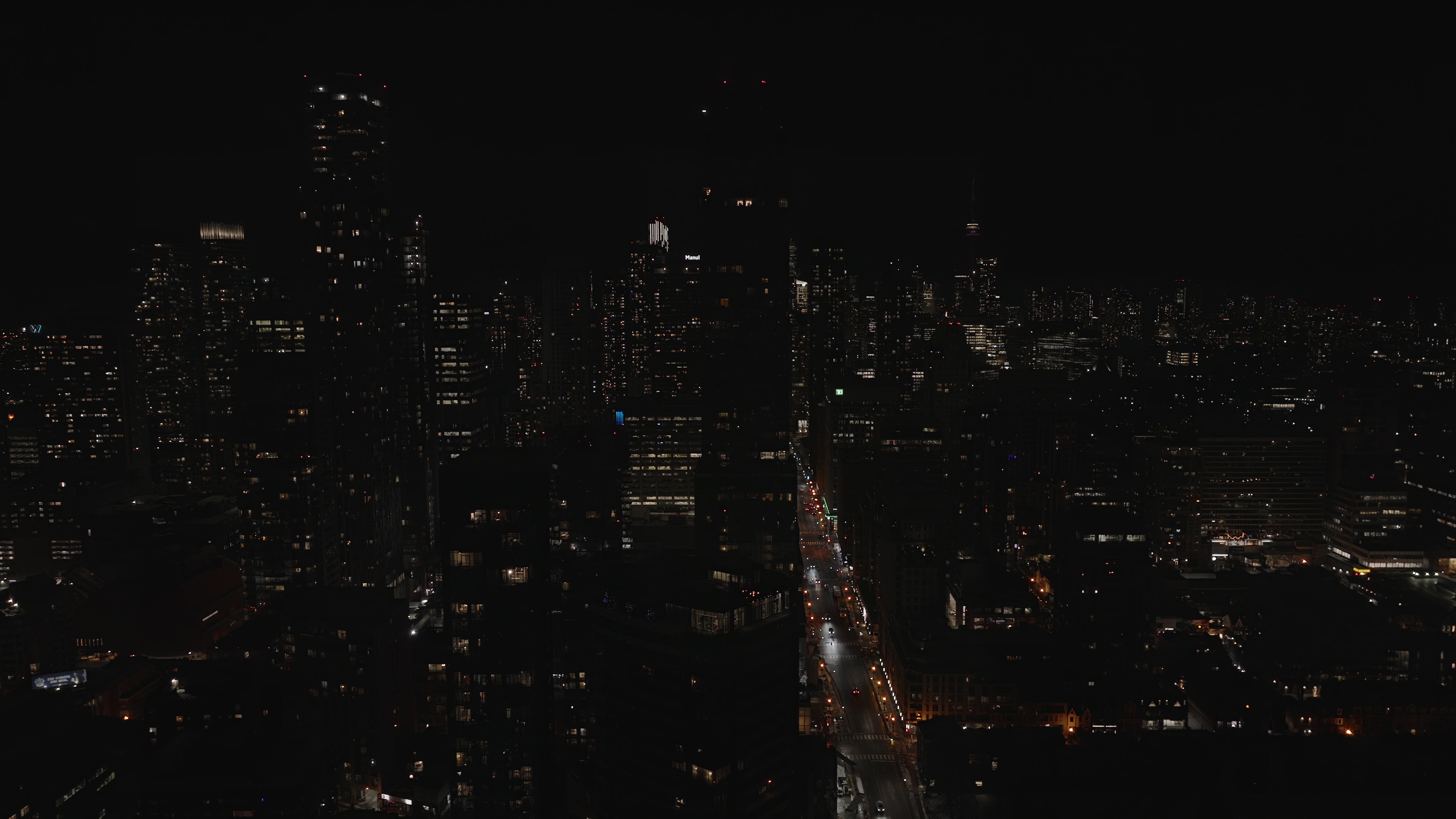 Metropolitan City Skyline Night Traffic - Aerial — 4K stock footage