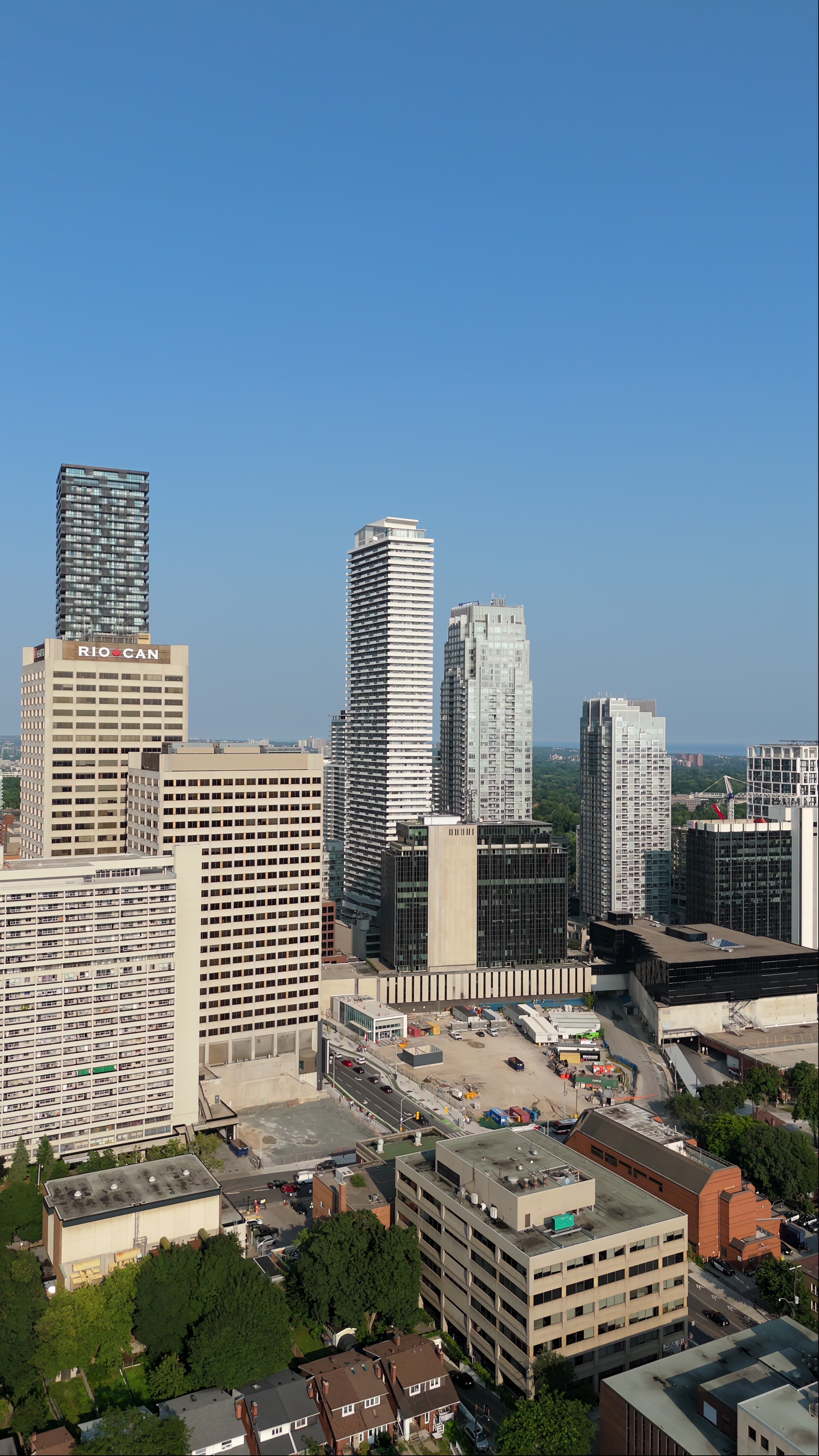 Aerial View of Modern Downtown Skyscrapers and Construction Site — Premium 4K stock footage