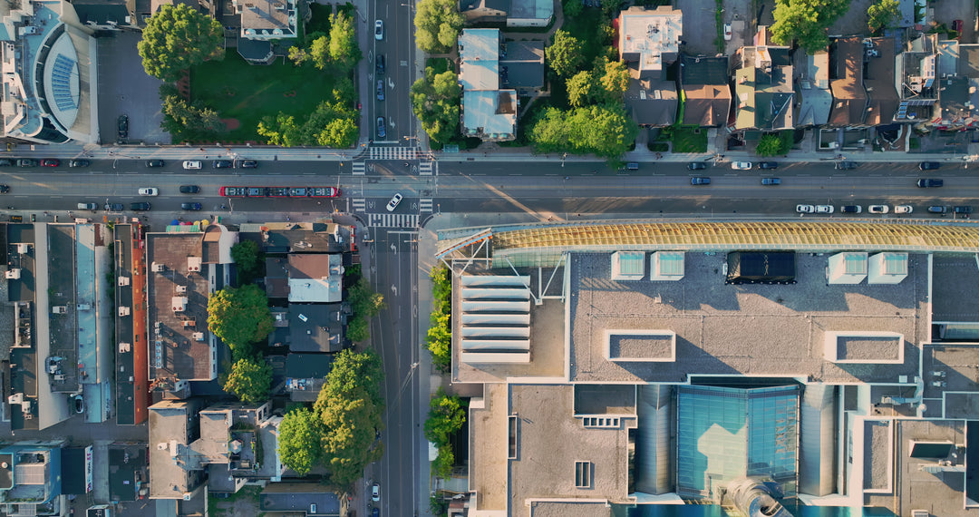 Aerial Top Down View of Urban City Street Intersection with Traffic — Premium 4K stock footage