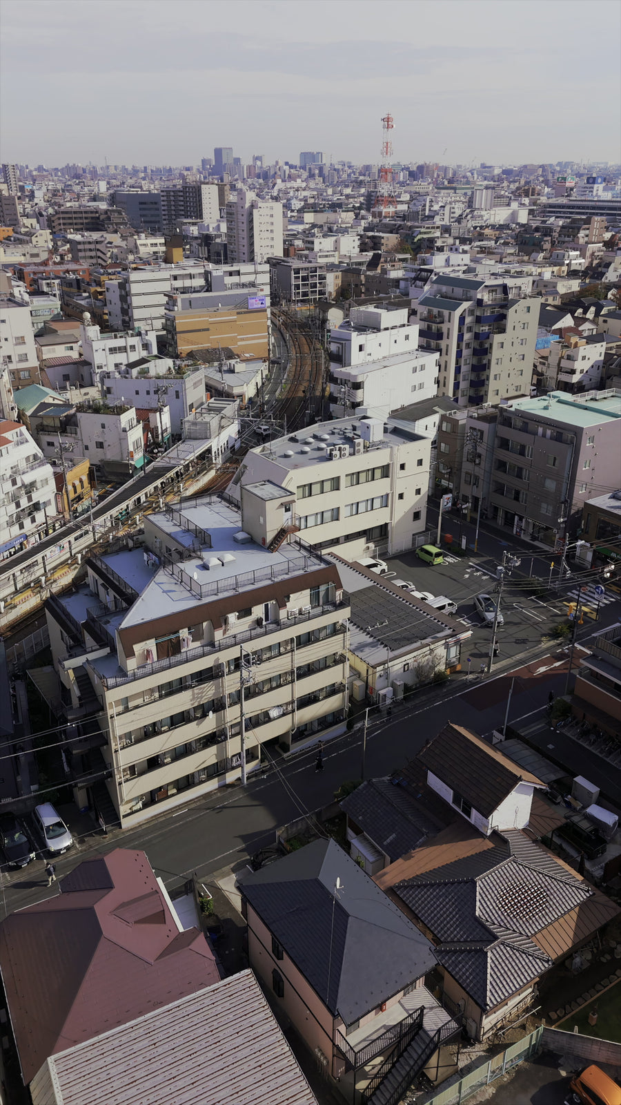 Tokyo Elevated Train Tracks Suburban Pan - Vertical Aerial