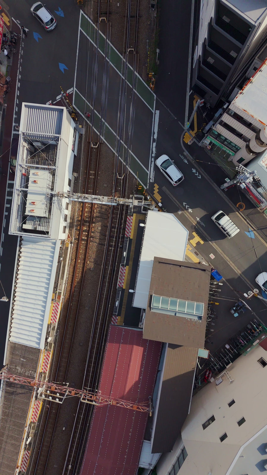 Japanese City Railway Crossing - Vertical Aerial