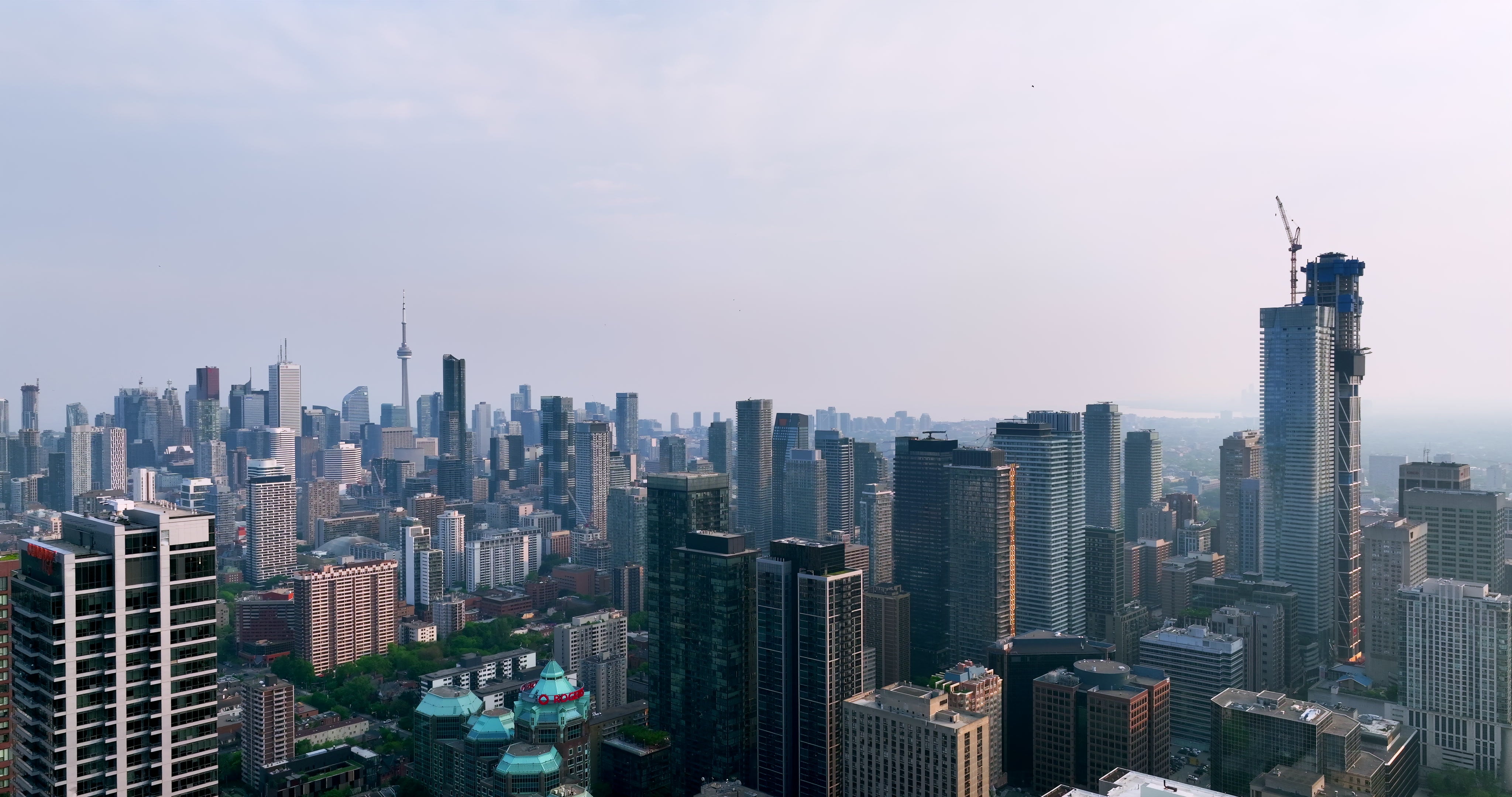 Toronto Skyline at Dawn with Construction Crane - Aerial — 4K stock footage