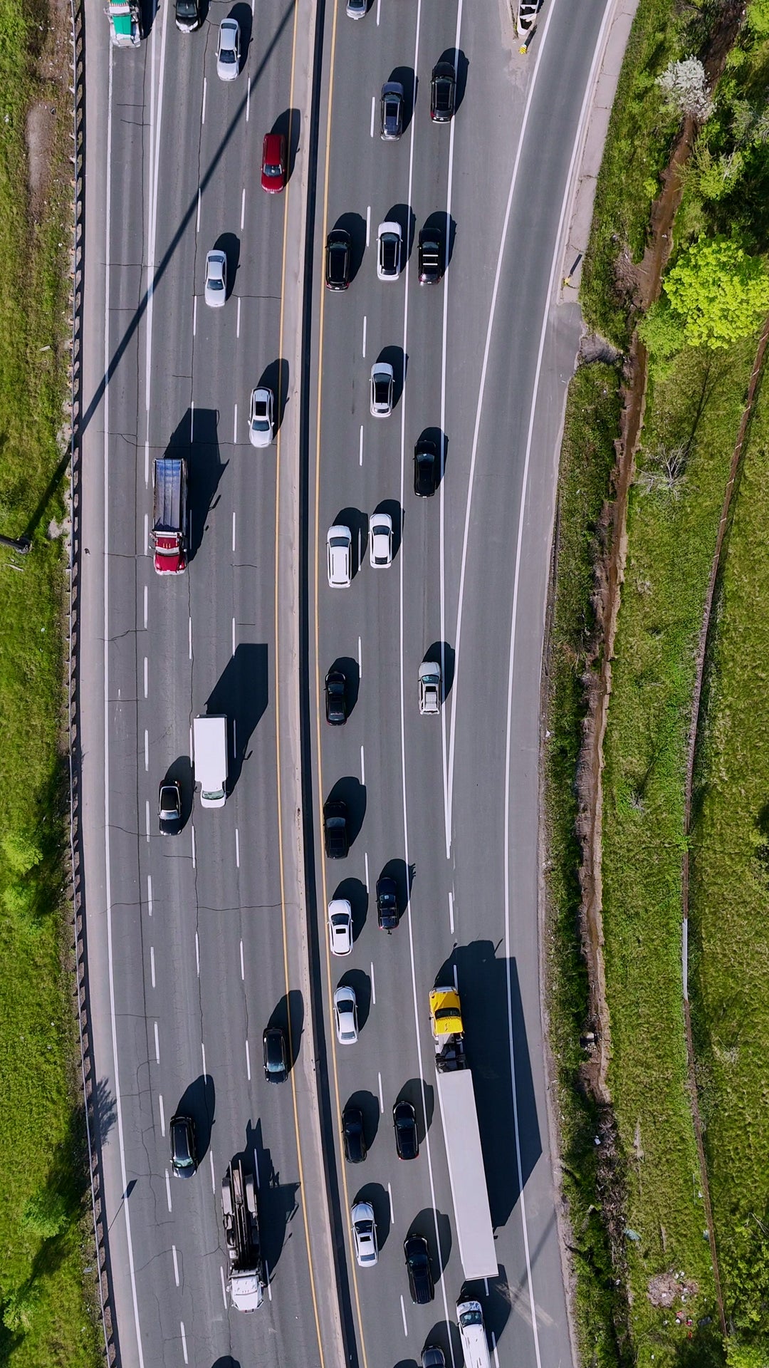 Aerial View of Busy Multi-Lane Highway Traffic Flow — Premium 4K stock footage