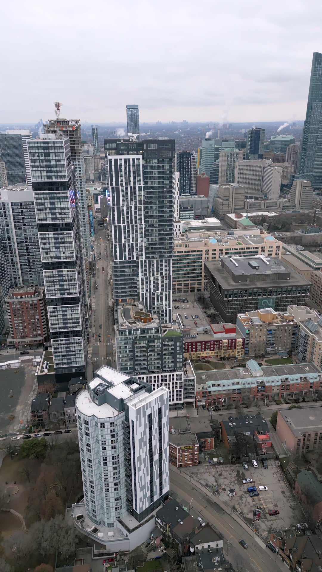Toronto Skyline with High - Rise Buildings - Overcast Aerial — 4K stock footage