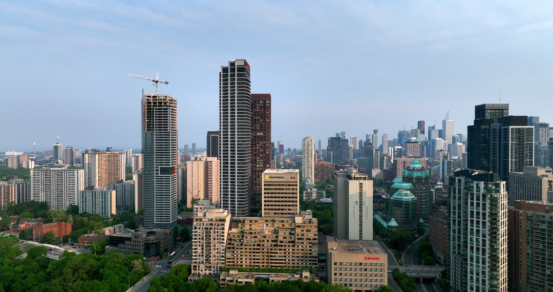 Toronto Skyline with Construction Crane at Sunrise - Aerial — 4K stock footage
