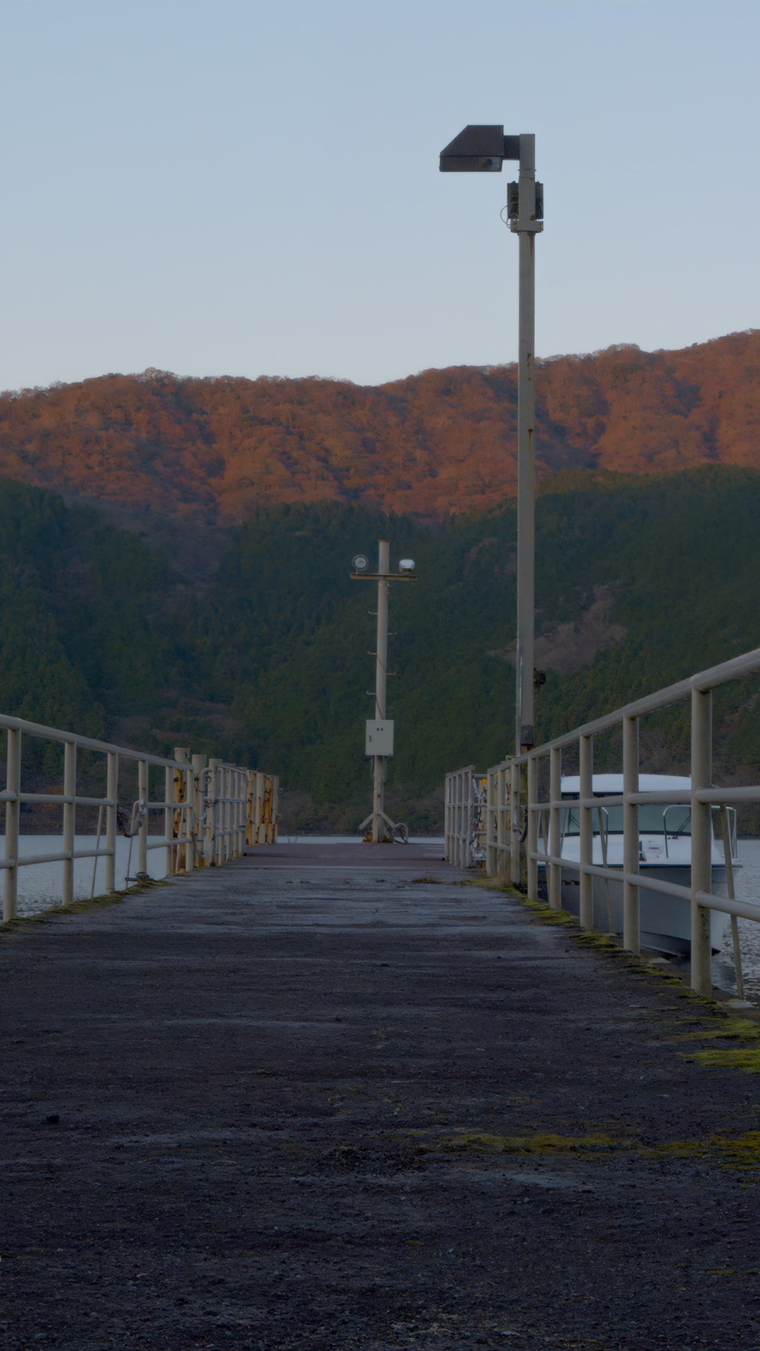 Sunlit Mountain Pier at Golden Hour in Japan — 4K stock footage