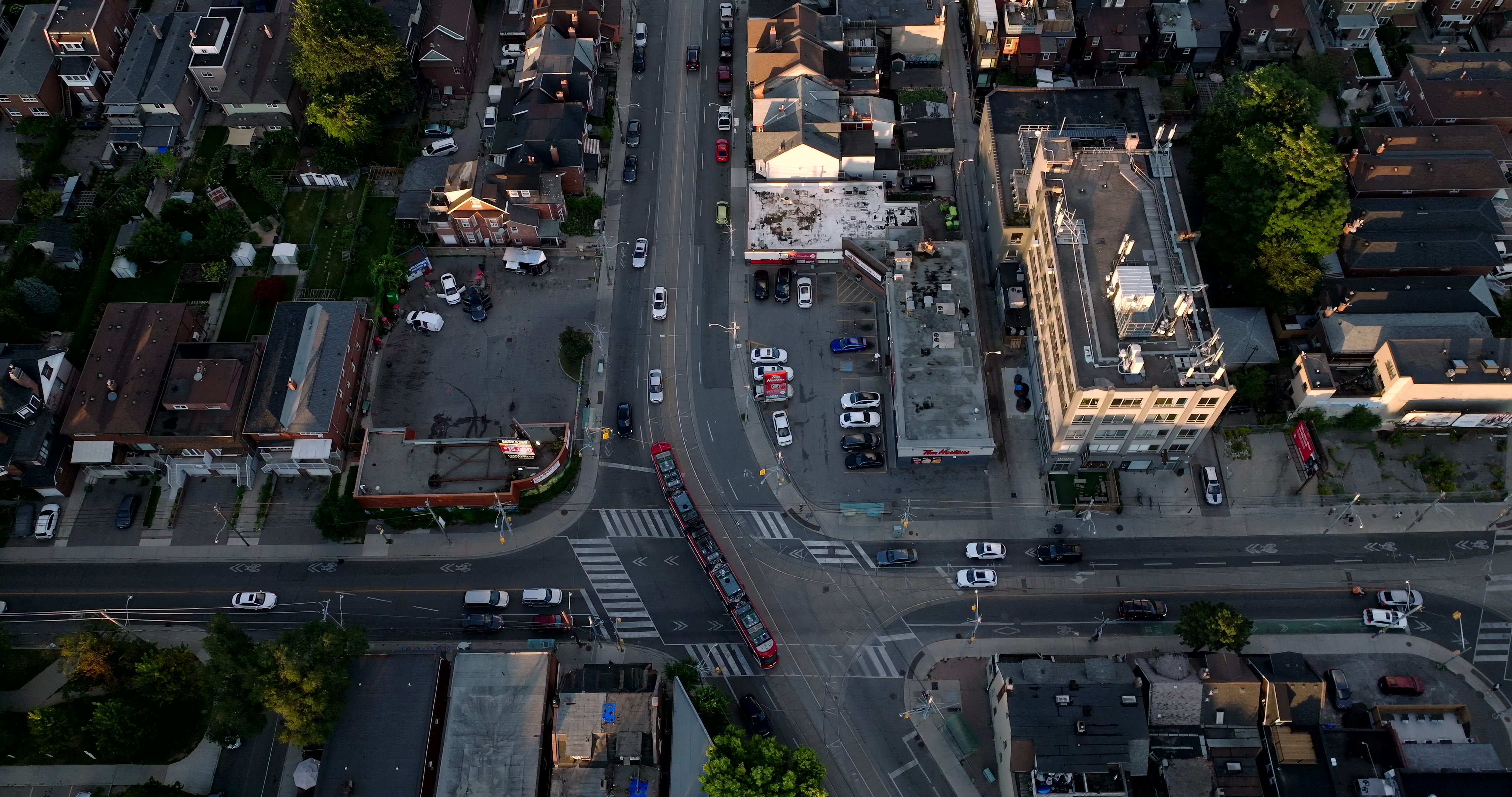 Toronto Busy City Intersection at Sunset - Aerial at golden hour — 4K stock footage