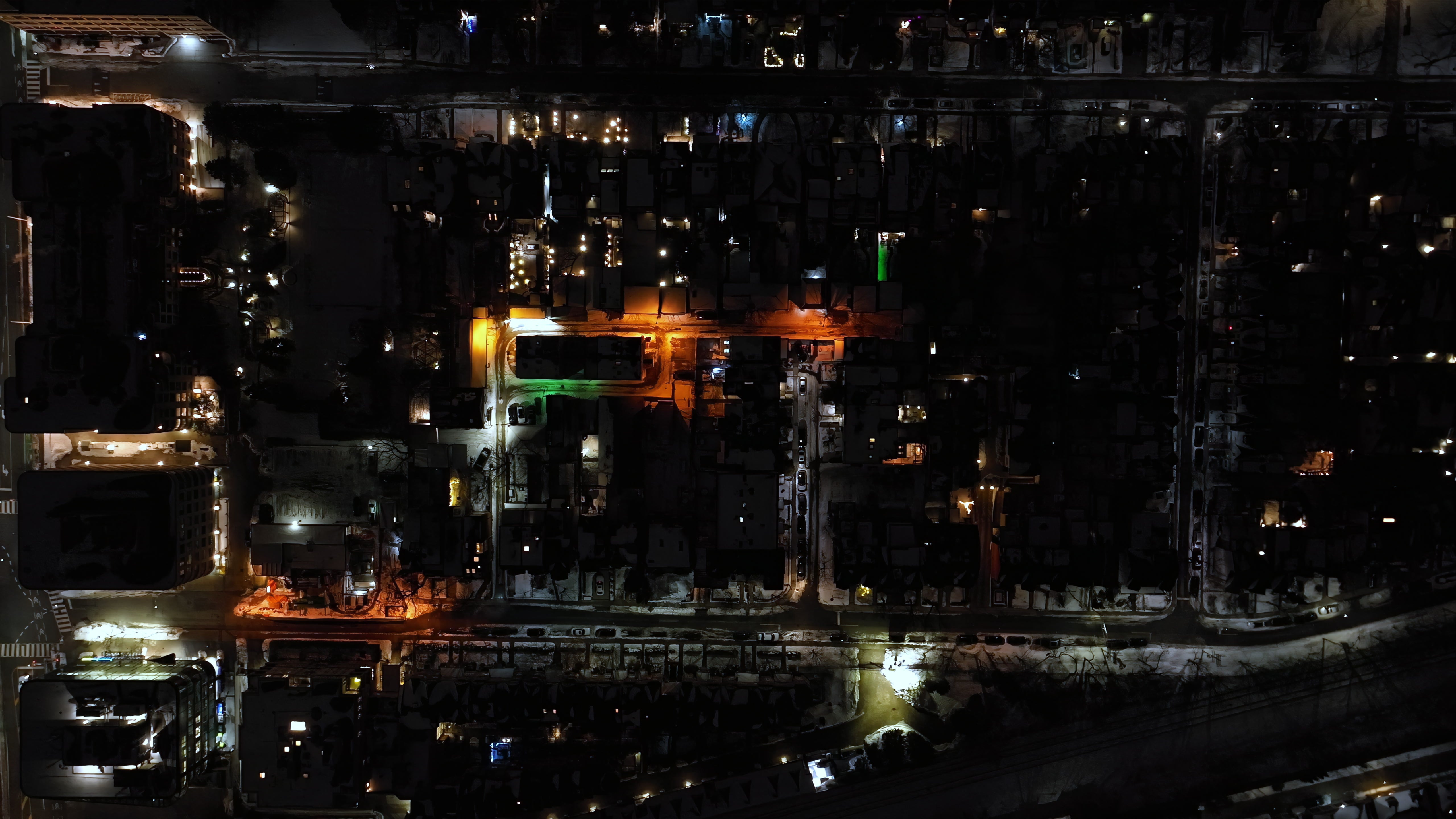 Illuminated City Streets at Night - Aerial — 4K stock footage