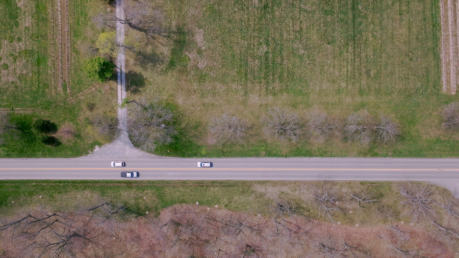 Rural Highway Through Farmland - 5K Top Down
