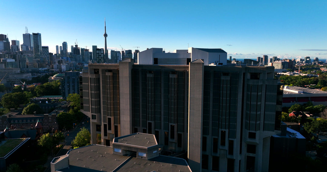 Toronto Skyline with Toronto Tower at Golden Hour - Aerial — 4K stock footage