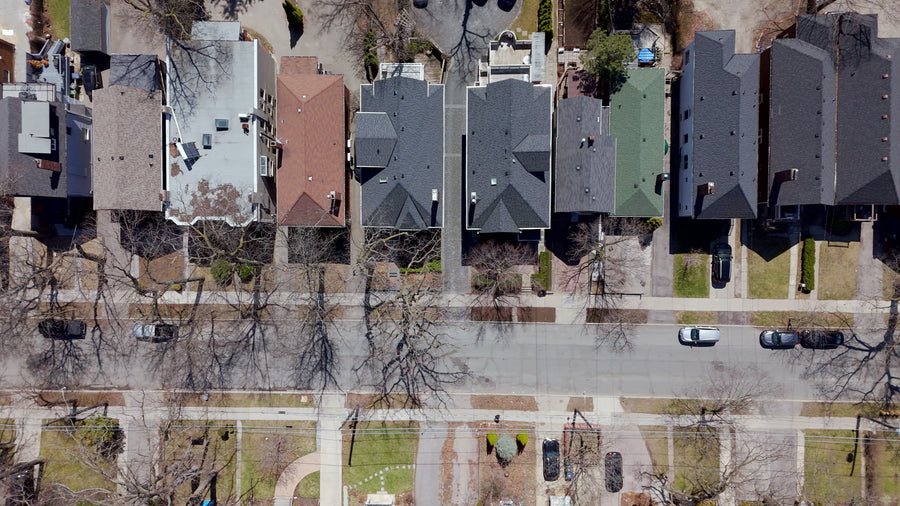 Suburban Residential Street with Houses - 4K Aerial