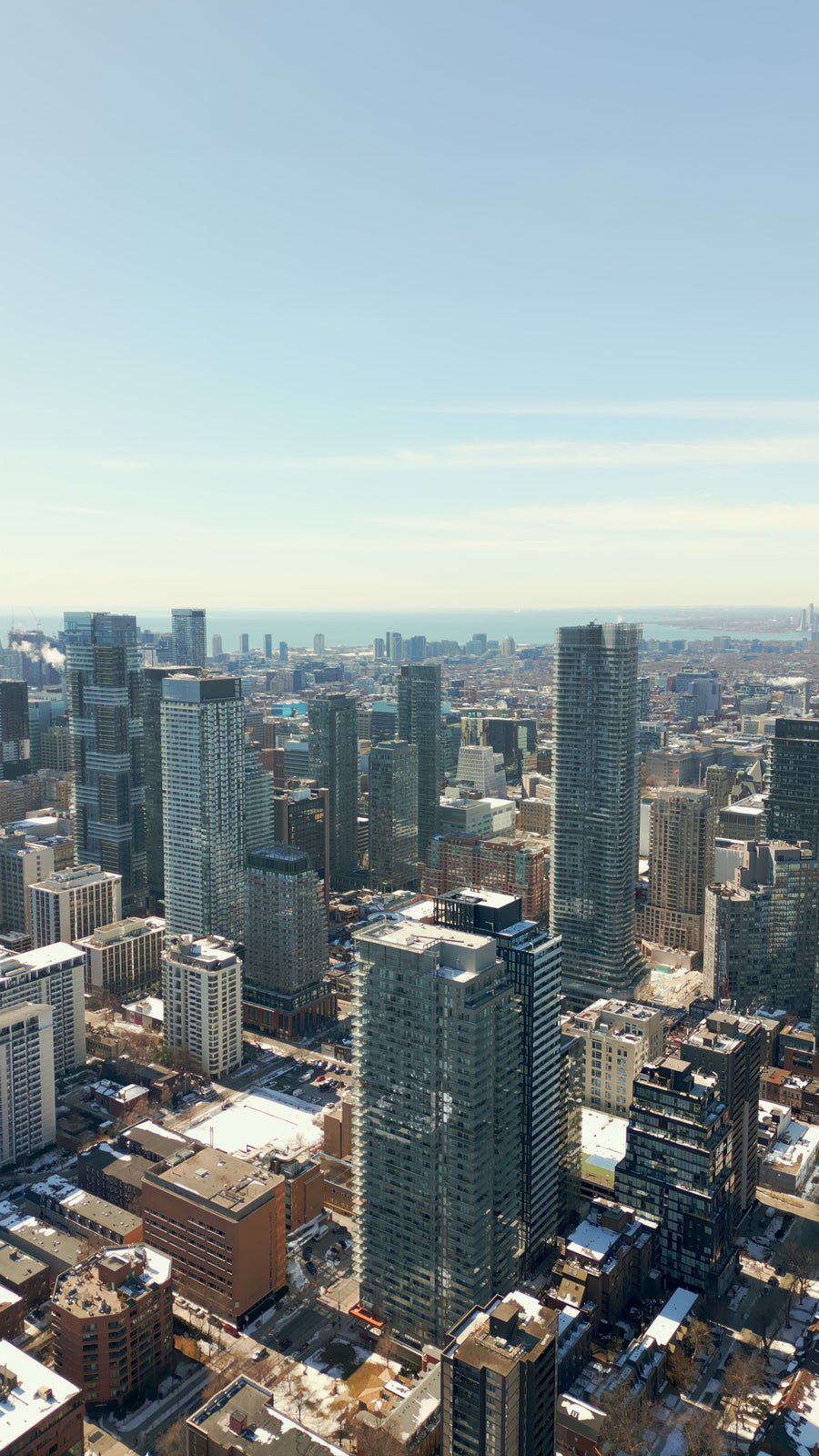 Toronto Skyline Winter Snowscape - Sunny 8K Aerial