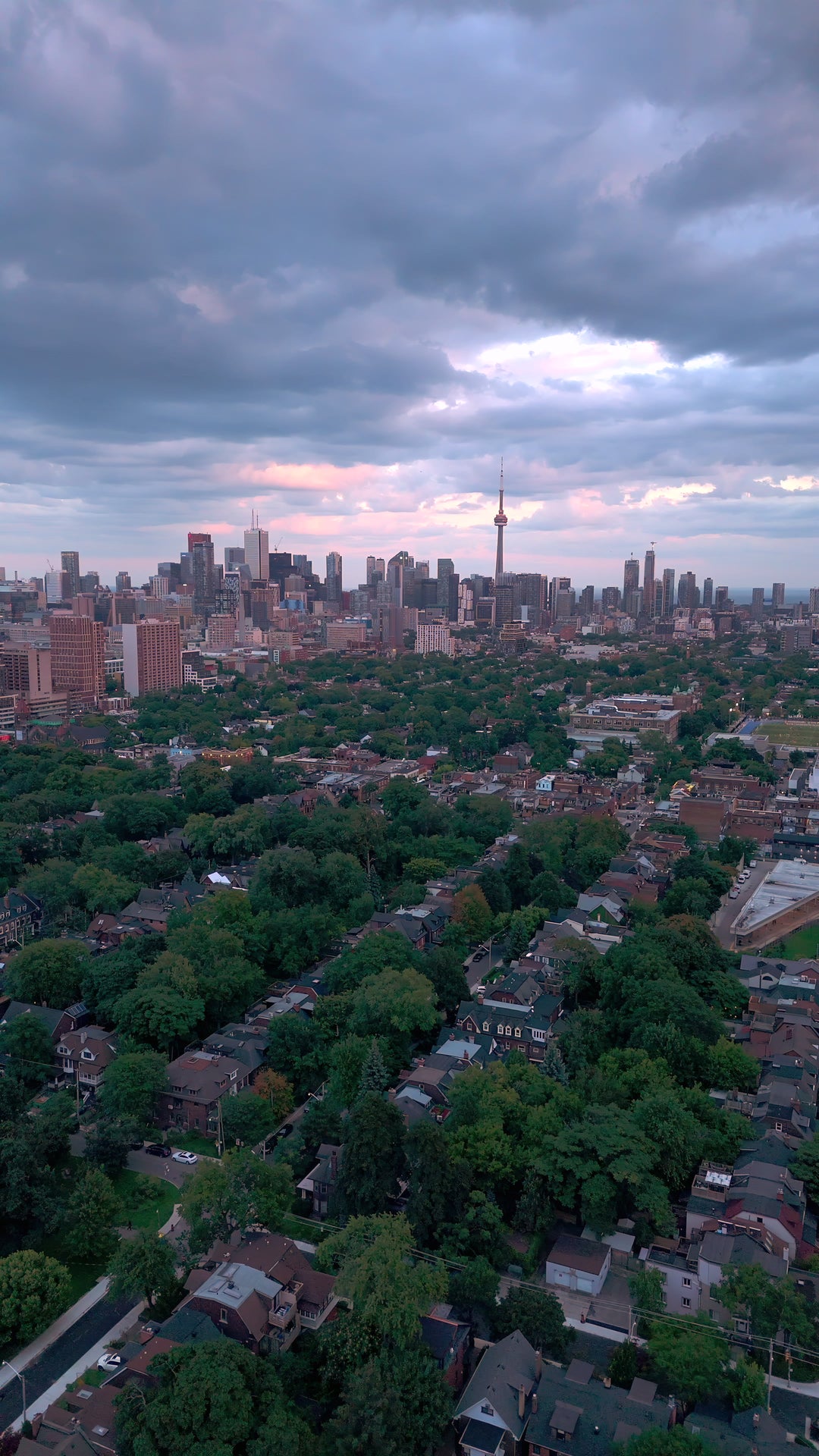 Toronto Skyline Twilight Glow - Aerial Pan — 4K stock footage