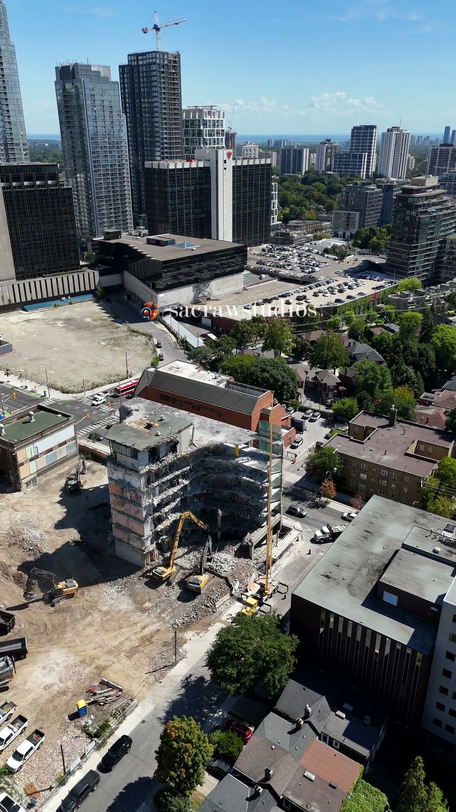 Urban Demolition Site with City Backdrop - Wide Aerial
